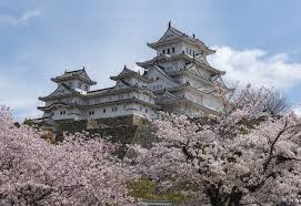 Japanese-style castle with cherry blossoms, adding an elegant Oriental design accent